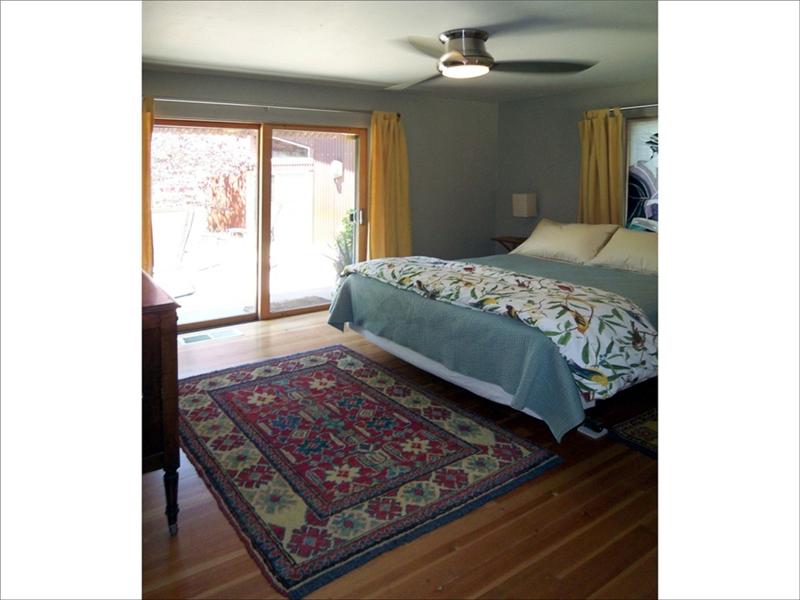 Bedroom w/Glass Door to Courtyard