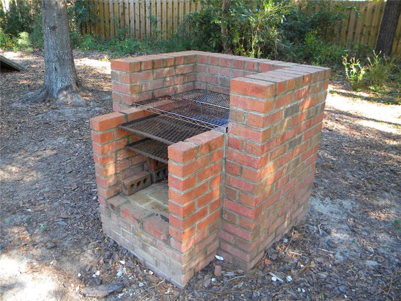 Brick BBQ Pit in Back Yard