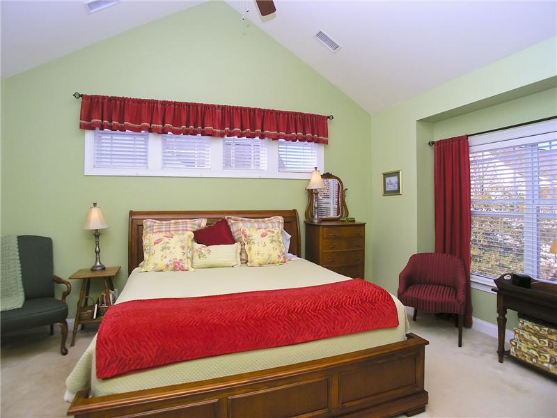 Master bedroom suite with cathedral ceiling