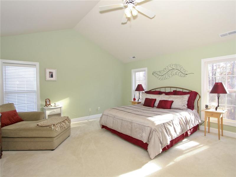 Master bedroom with cathedral ceiling