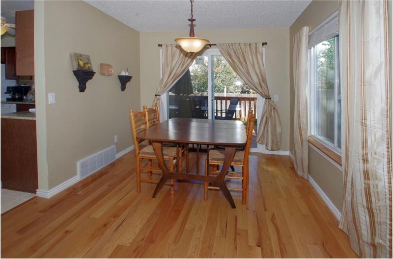 Another view of dining room and entry into kitchen