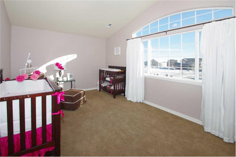 Large, bright bedroom with walk-in closet!  This home has ceiling fan pre wires throughout.