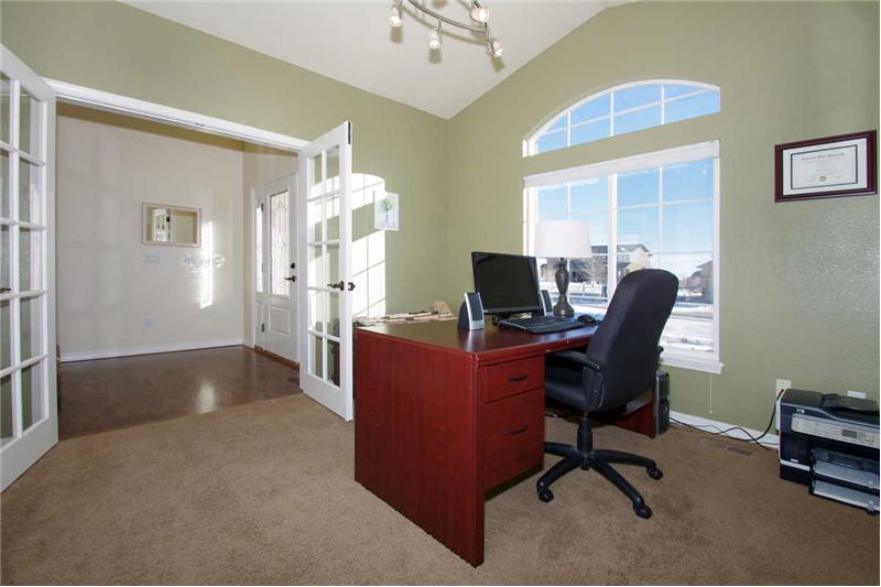 Main level office with French doors can also be used as a main level 5th bedroom.