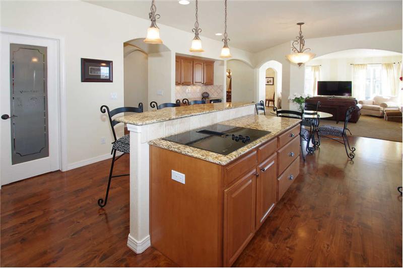 Another view of the spacious kitchen! Walk-in pantry and large kitchen island.