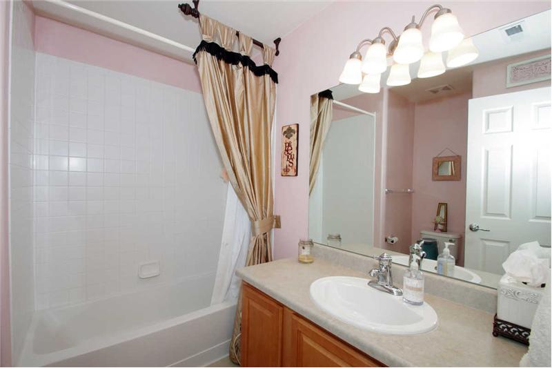 Master bath with linen closet.