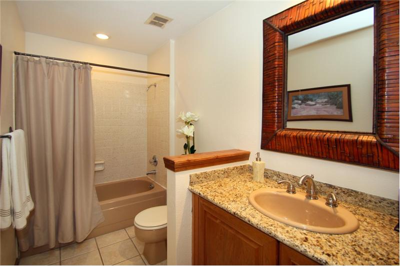 Full bath with granite countertop
