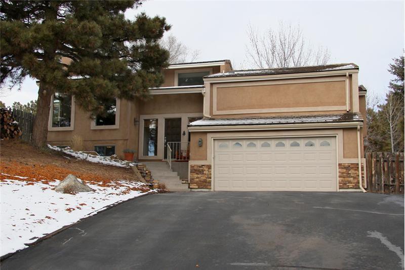Beautiful home on a private 1/2 acre lot with stucco exterior and a concrete tile roof!