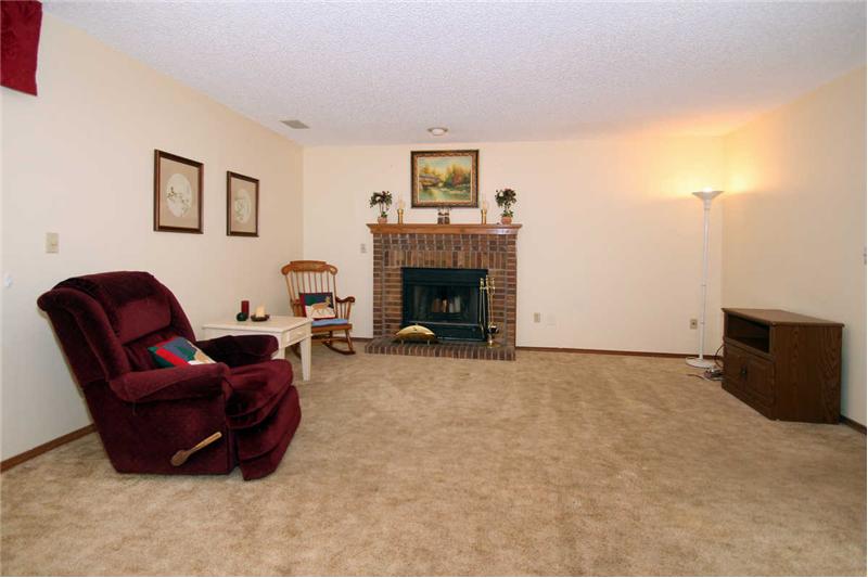 Family room with wood burning fireplace