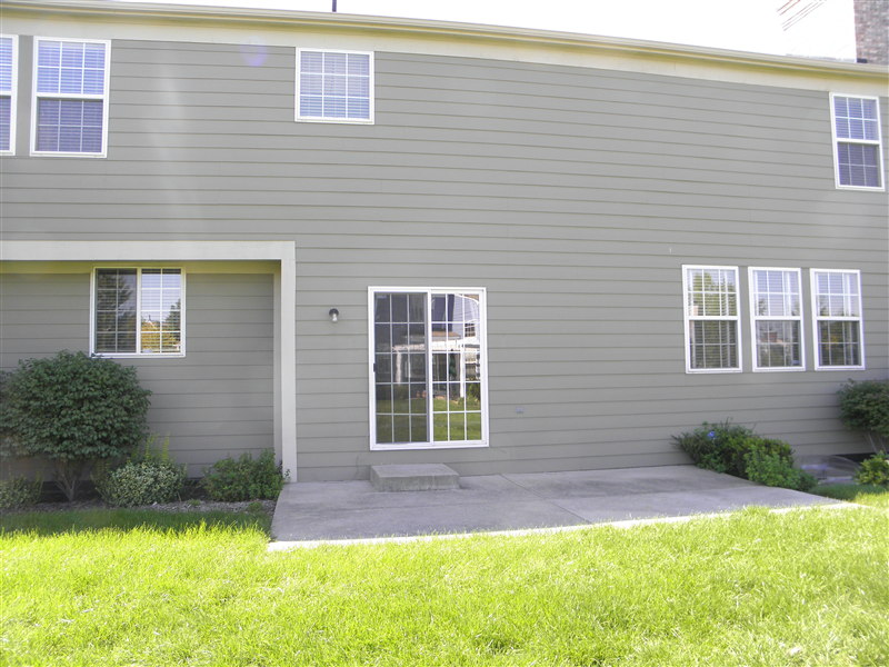 REAR OF HOUSE, PATIO AND PROFESSIONAL LANDSCAPING