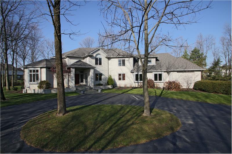 Beautiful home site w/mature trees and circular driveway.