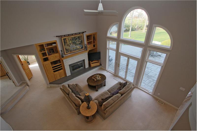 Great Room: Wonderful and open, 2-story great room offers beautiful views of backyard.