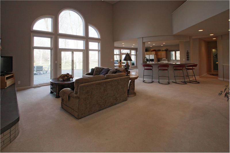 Great Room: Great room and kitchen are separated with a convenient wet bar.