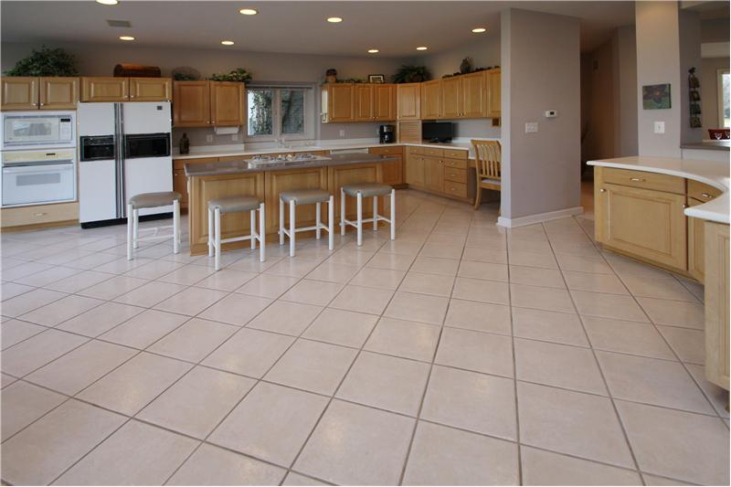 Kitchen: Spacious kitchen with center island and huge 10x10 walk-in pantry.