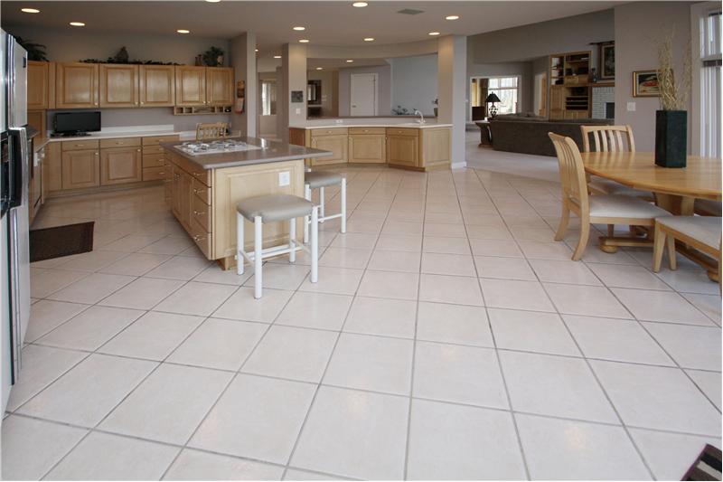Kitchen: Plenty of cabinets and even a built-in workstation.