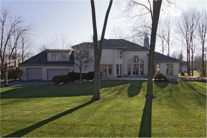 Exterior Back: Beautiful back yard on large lot. The patio includes a hot tob and fire pit. Also enjoy the Koi pond.