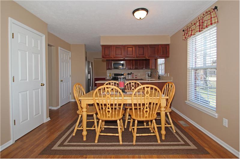 Breakfast room.  Hardwood floors in entry, kitchen and breakfast room.