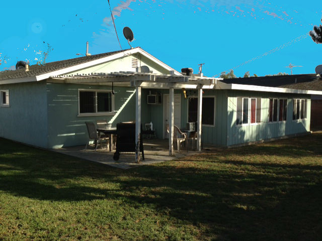 Looking at house from backyard