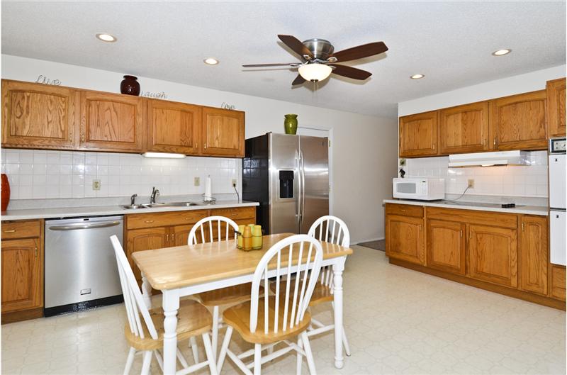 Kitchen has lots of cabinets and counter space