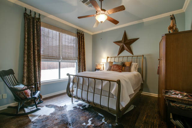 Secondary bedrooms are large. This bedroom is located on the first floor of the home.