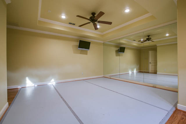 Enjoy exercise in the hard wood floor mirrored yoga room. Enjoy getting fit!