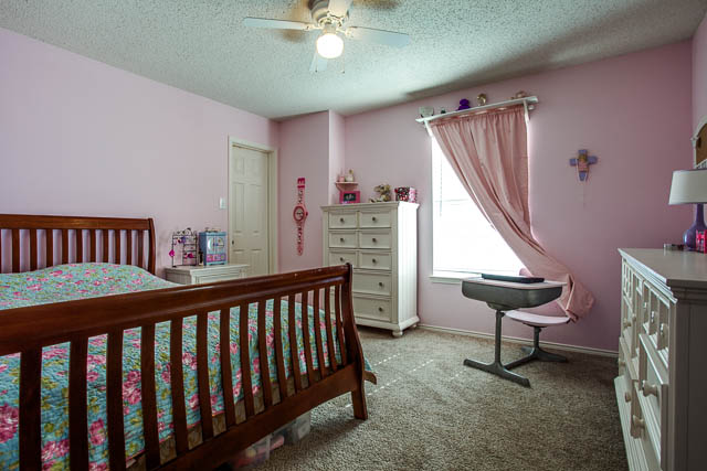 Three bedrooms are located upstairs.