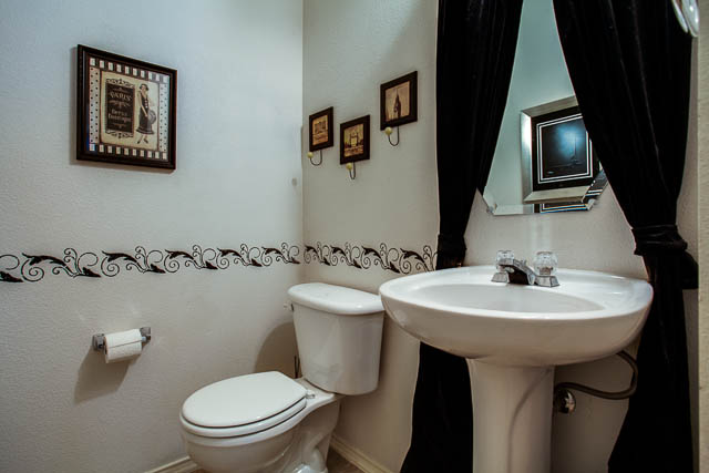 The home offers two full size bathrooms and one half bath pictured here.