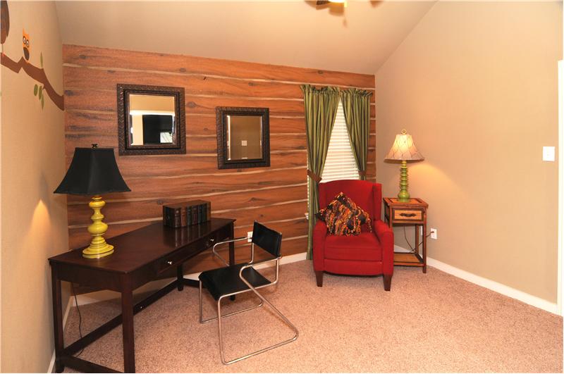 Formal living area offers designer paint.