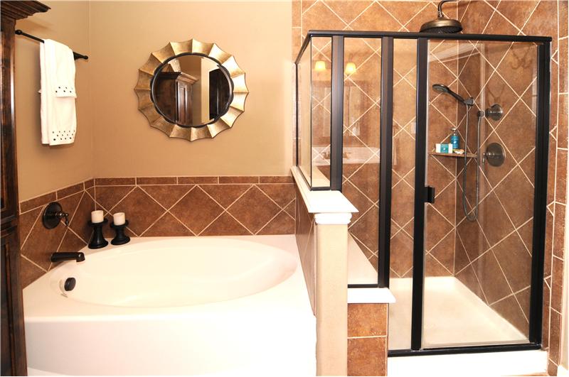 Separate shower and large garden tub are perfect in the master bathroom.