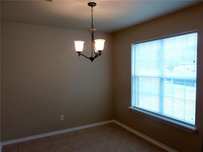 New carpet and tile flooring throughout the home.