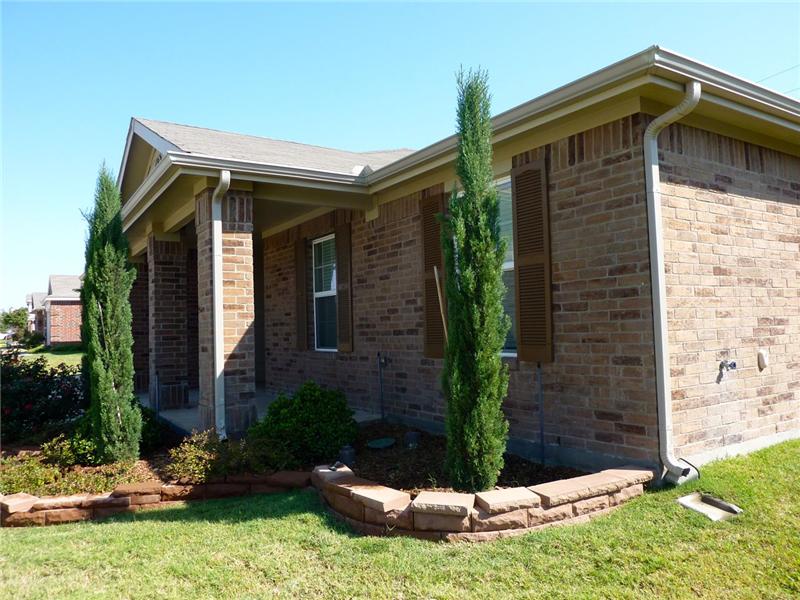 This home has great curb appeal and landscaping!