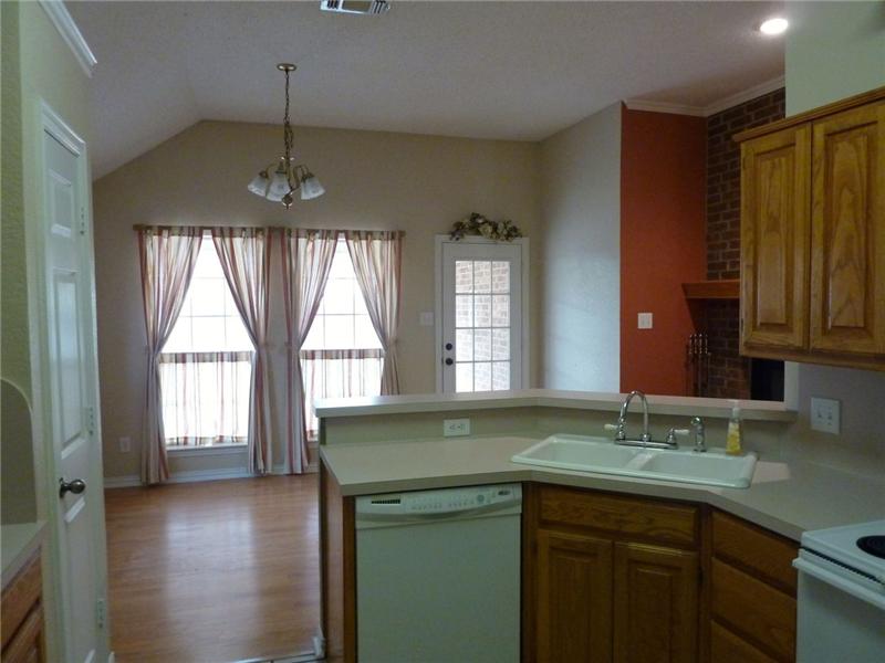 The kitchen has ample counter space and cabinet space.