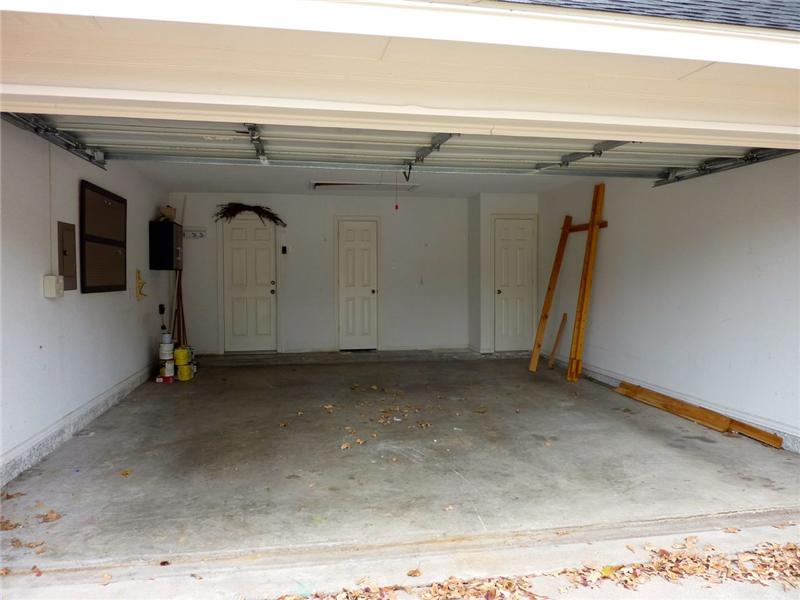 The 2 car garage has plenty of space for cars and/or storage!