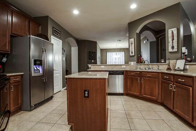 Cooks will enjoy all the counter space and the island in the middle of the kitchen!