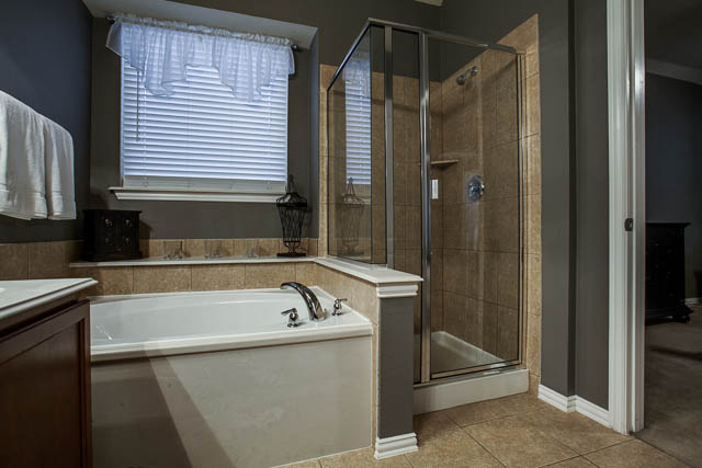 The master bath offers a separate shower and tub to relax in after a long day.