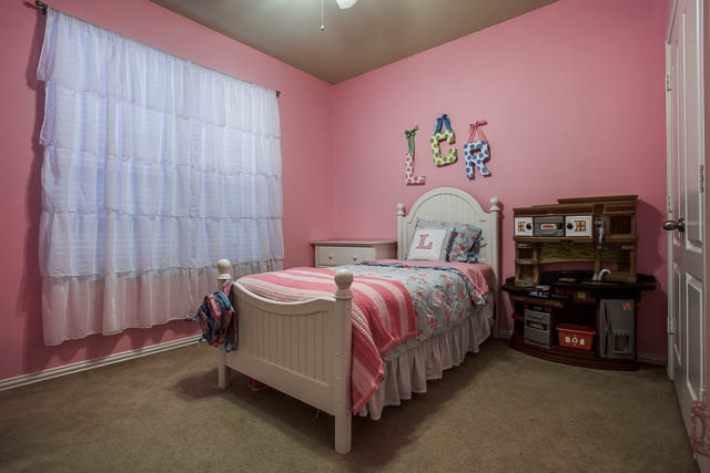 Both of the secondary bedrooms offer space and natural light.