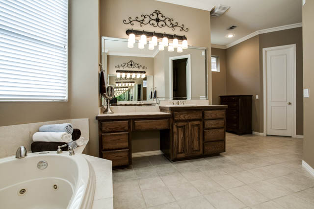 The master bath has plenty of storage and built-ins.