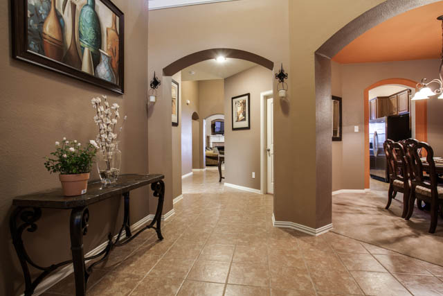 Notice the beautiful archways and open floor plan.