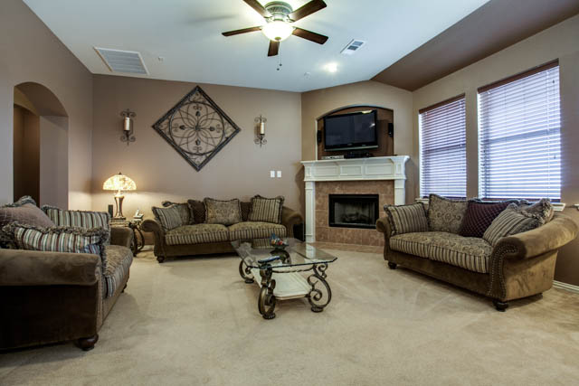 The living area features a gas fireplace.