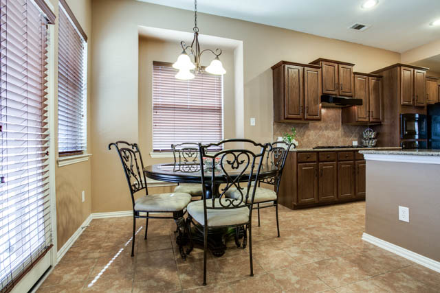 A breakfast nook is located just off the kitchen.