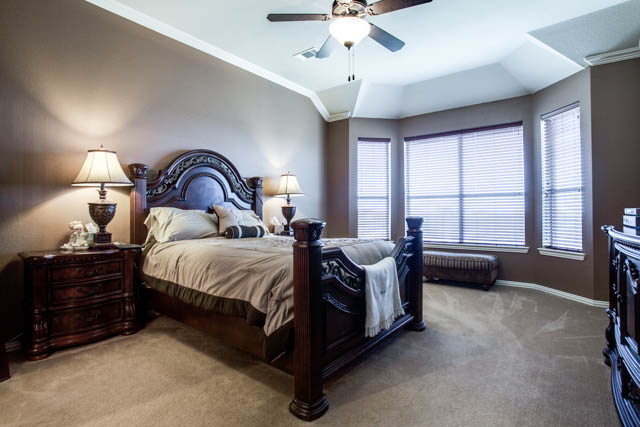 The master suite is huge with bay windows, window seat, and more.