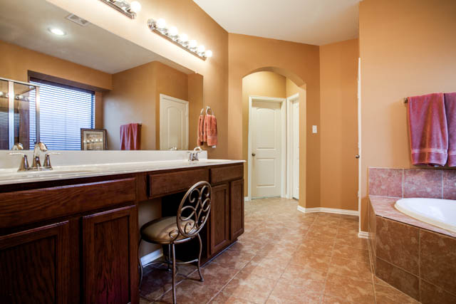 Enjoy the private master bath with dual vanities!