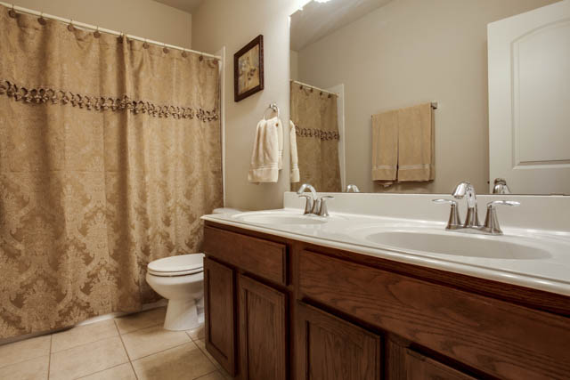 Two full bathrooms are featured in the home. This full bath is upstairs.