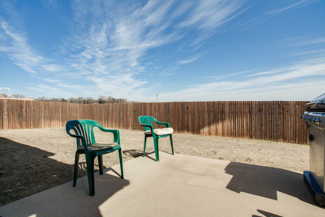 Enjoy blue skies on the open patio in back.