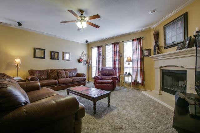 Ceiling fans for warm weather and a wood-burning fireplace for cold weather!