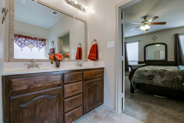 Separate vanities and plenty of cabinet space make this master bath perfect!