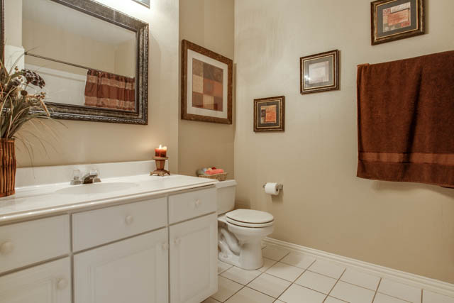The home features two full baths and one half bath.