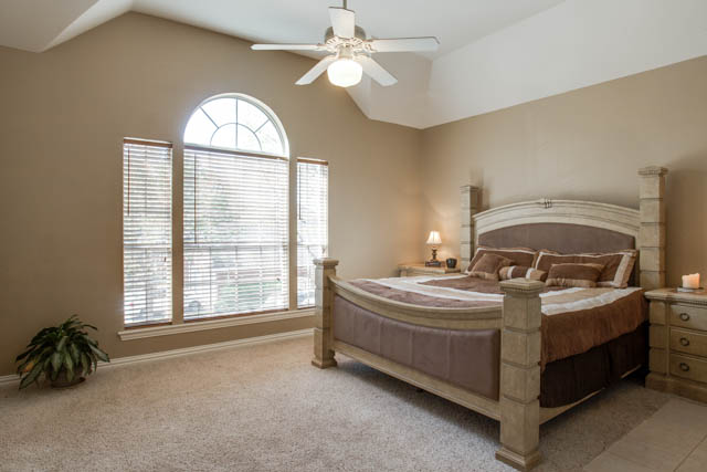 The master suite is large with lots of natural light.