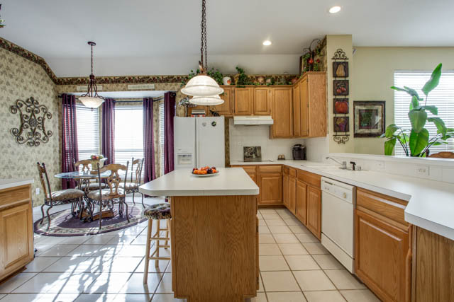 A spacious kitchen is open to the living area.