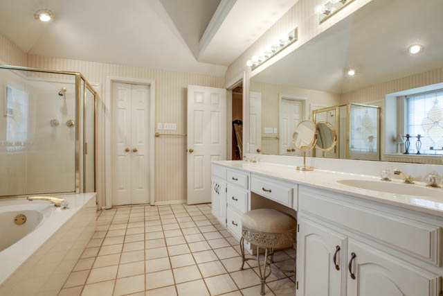 The master bath offers lots of counter space and a vanity.