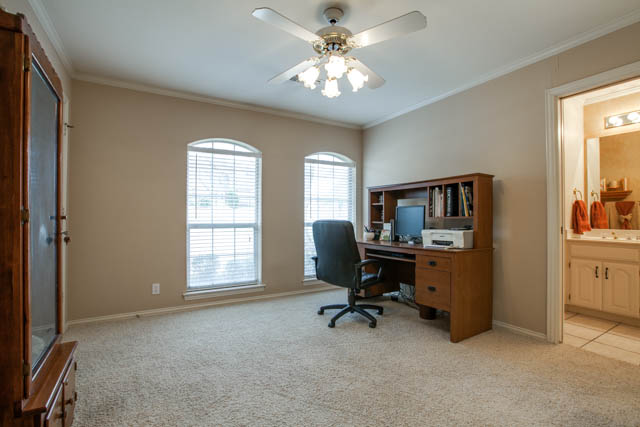 The master bedroom has a sitting area, perfect for a little reading nook!